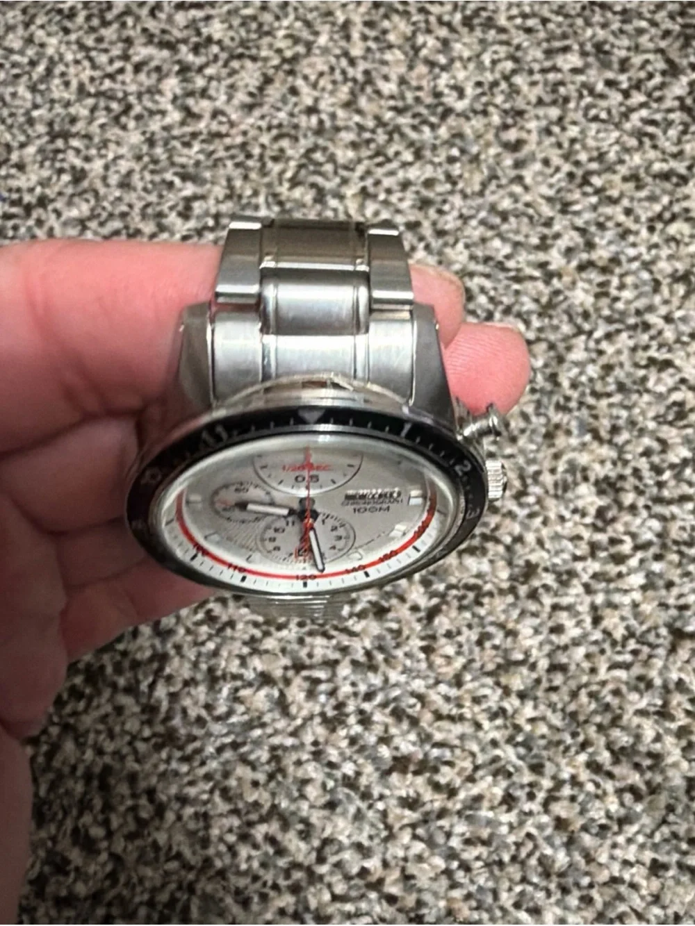Seiko Silver Watch with White Dial and Red Accents